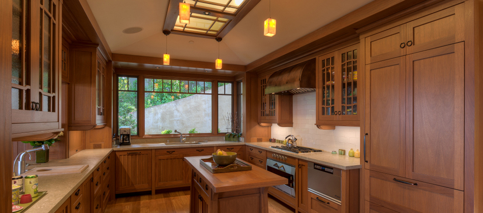 Warm wood kitchen with large windows
