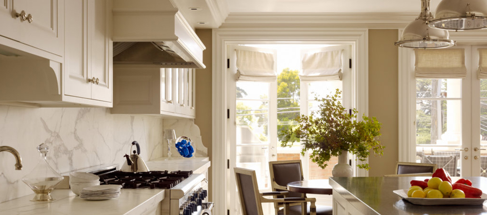 White kitchen with marble backsplash